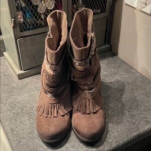 Naughty Monkey “Poncho” Boots-Taupe w/ fringe,studs,braids,rug,& wrap detailing.